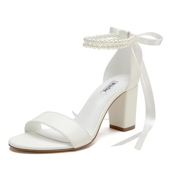 a women's white high heeled sandal with pearls on the ankle strap