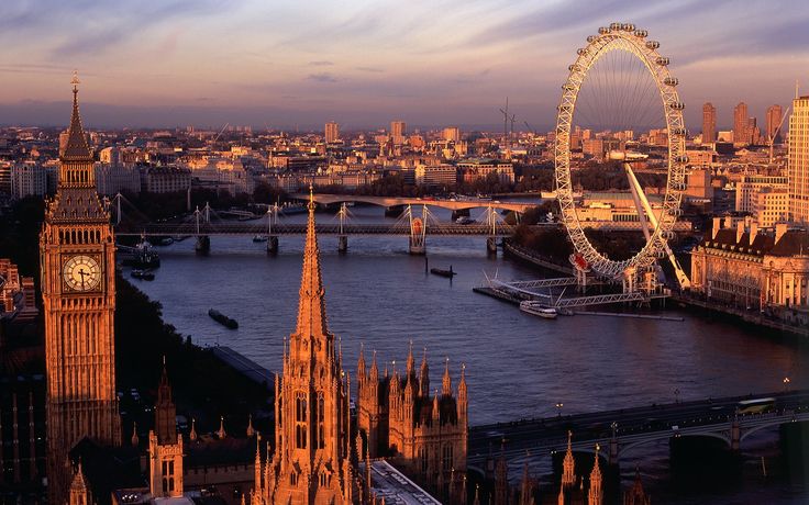 an aerial view of the london skyline with big ben in the foreground and the river thames below