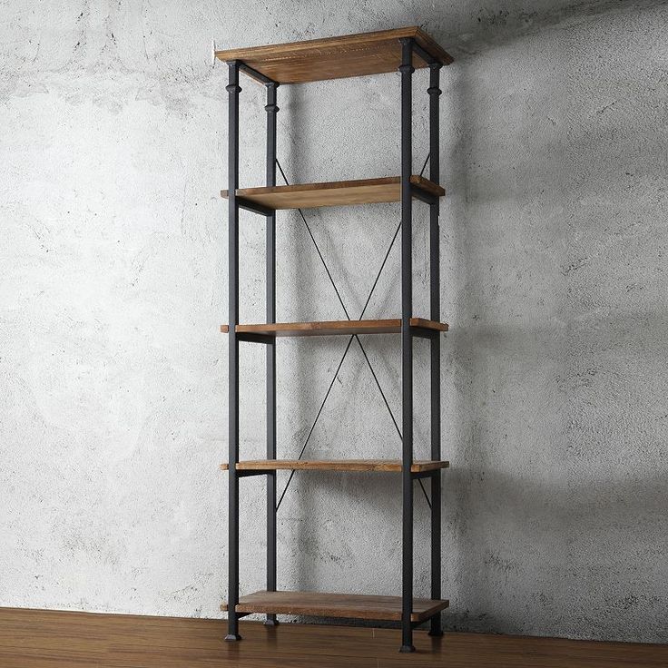 an industrial style shelving unit with four shelves