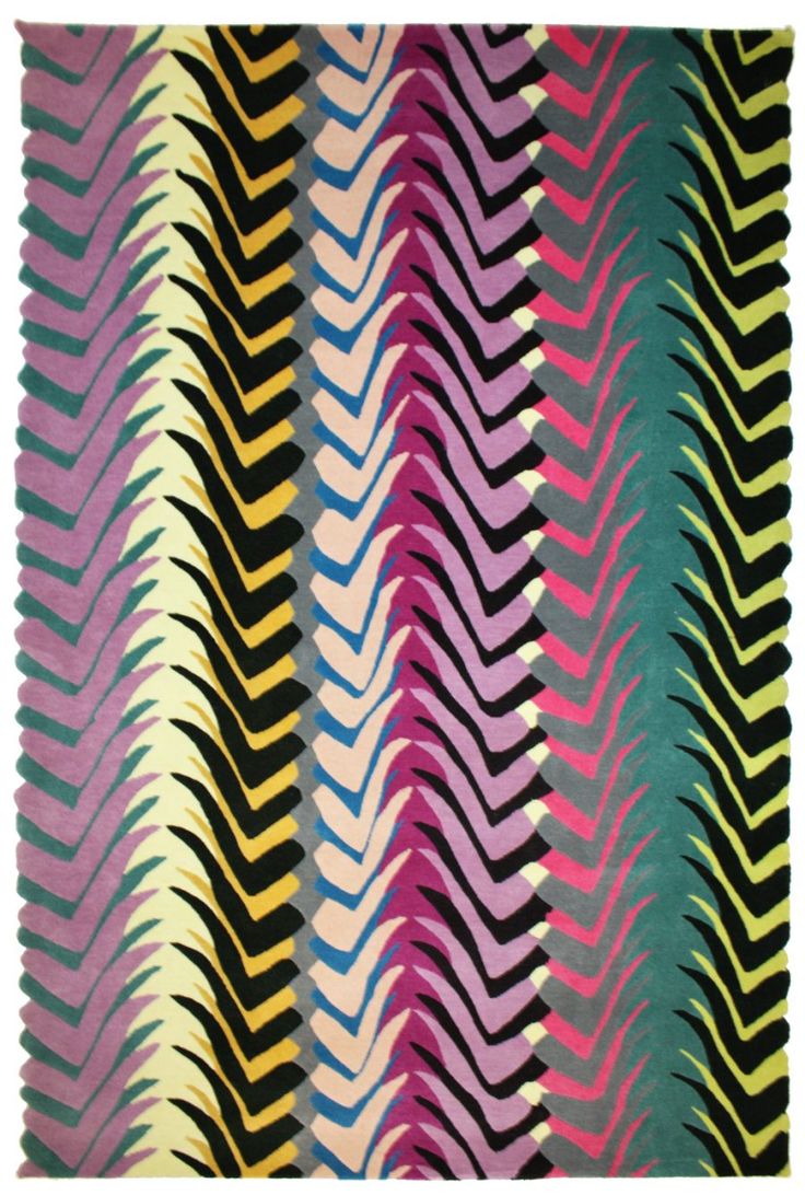 a colorful rug with wavy lines on it