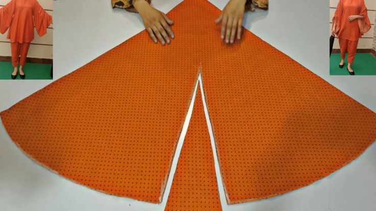 a woman cutting out an orange dress with scissors