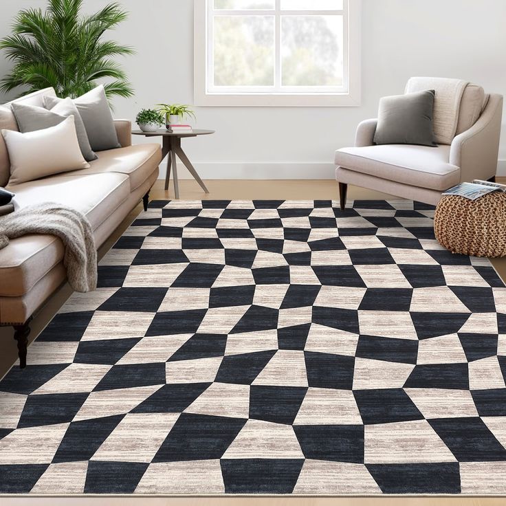 a living room with two couches and a black and white rug on the floor