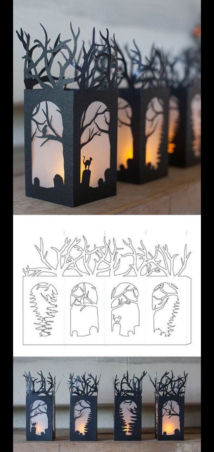 paper lanterns with animals and trees on them are lit up by candles in the shape of houses