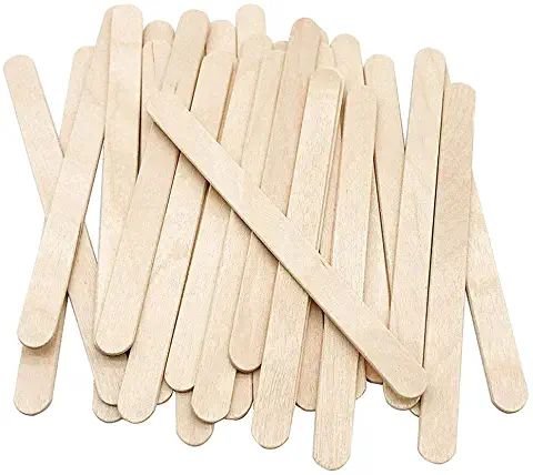 wooden popsicles are lined up on top of each other