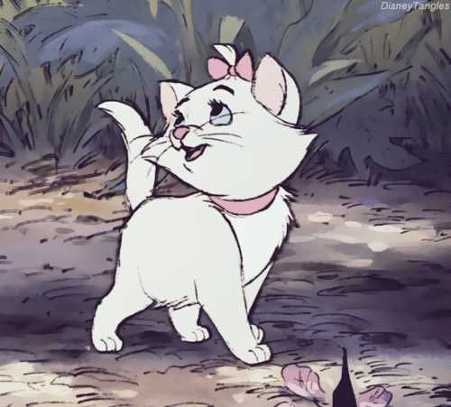 a cartoon cat standing in the dirt with its mouth open