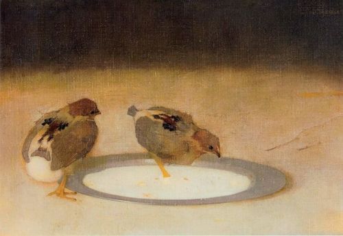 two small birds sitting on top of a white plate