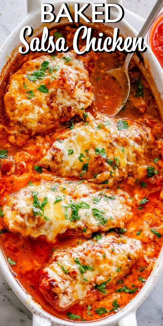 baked salsa chicken in a white casserole dish