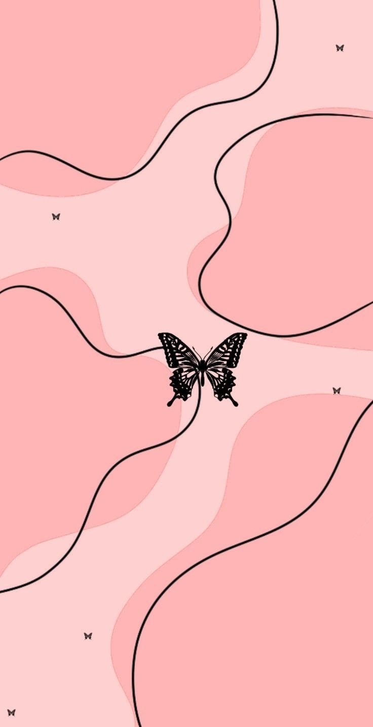 a black and white butterfly is flying over the pink hills with stars in the sky