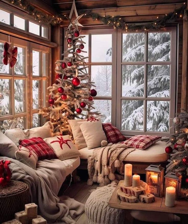 a living room filled with furniture and a christmas tree in the middle of the room