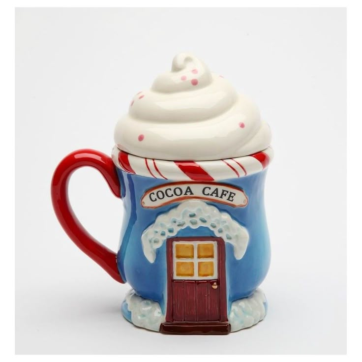 a ceramic coffee cup with a whipped cream topping on it's top and bottom