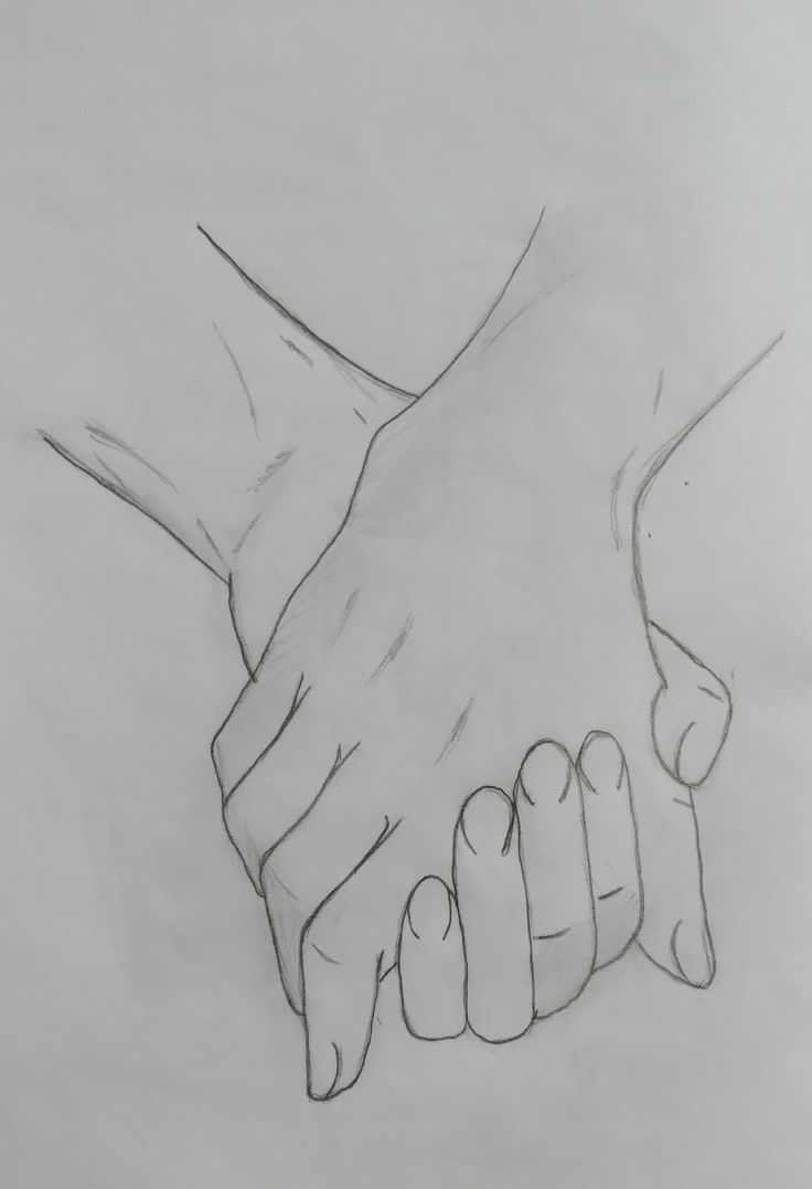 two hands are holding each other's hand in the middle of a drawing on paper