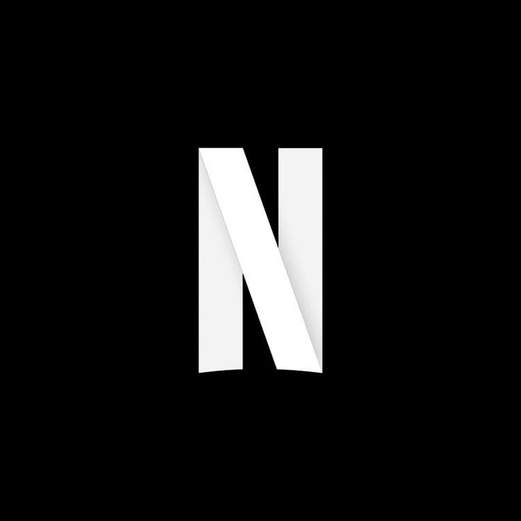 the letter n is made up of white paper on a black background, and it appears to be cut into smaller rectangles