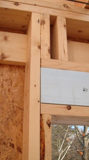 the inside of a house being built with wood framing