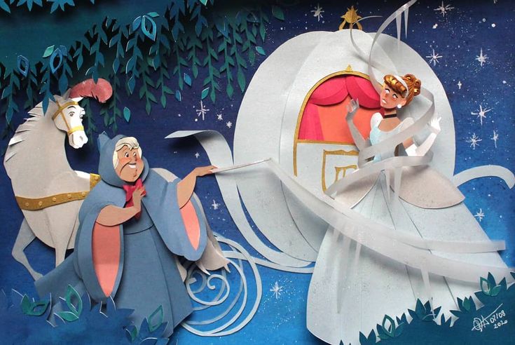 paper cut out of disney characters riding in a carriage