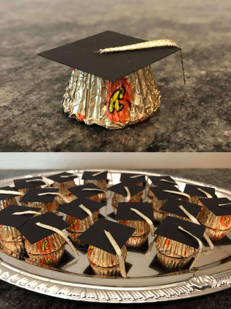 there are cupcakes that have been placed on top of each other in the shape of graduation caps