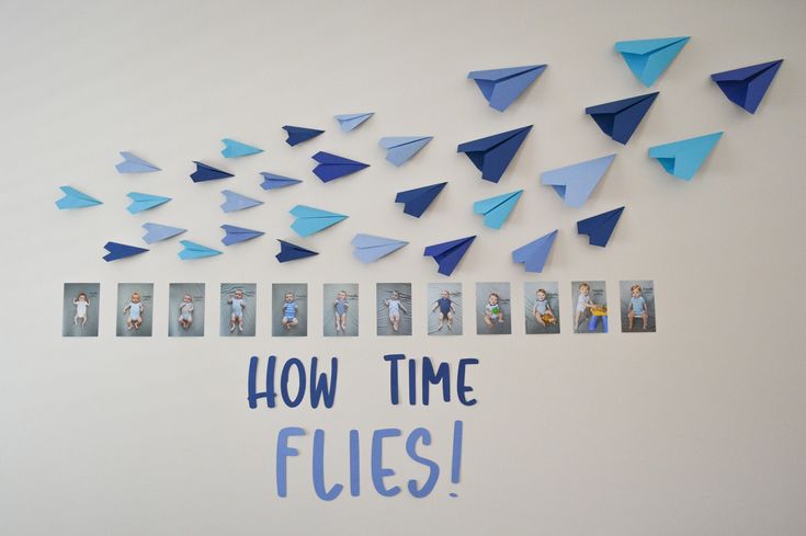 there are many blue paper airplanes flying in the air with words below them that read how time flies