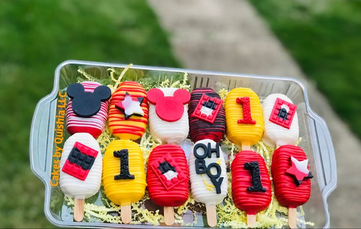 a tray filled with lots of different shaped cake pops