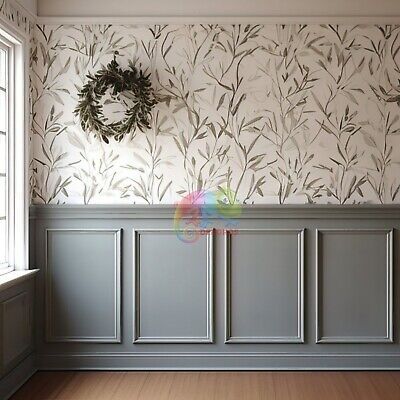 an empty room with a wreath on the wall and wooden floors in front of it