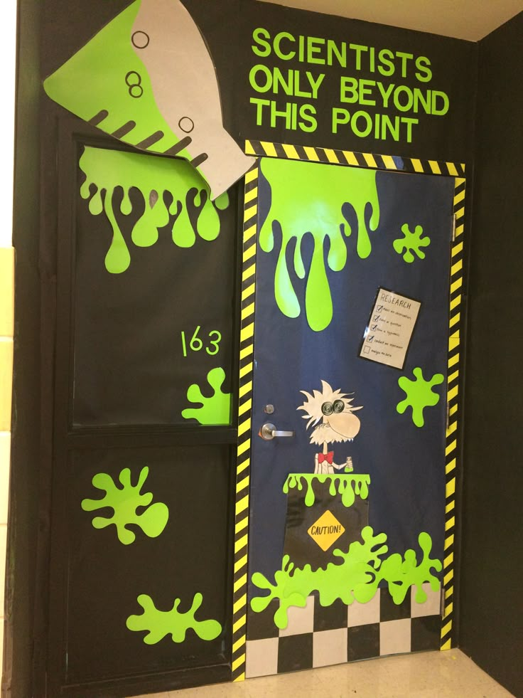 a door decorated with green and black paint