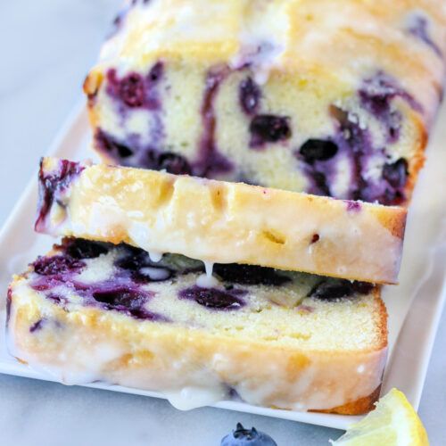 two slices of lemon blueberry bread on a plate