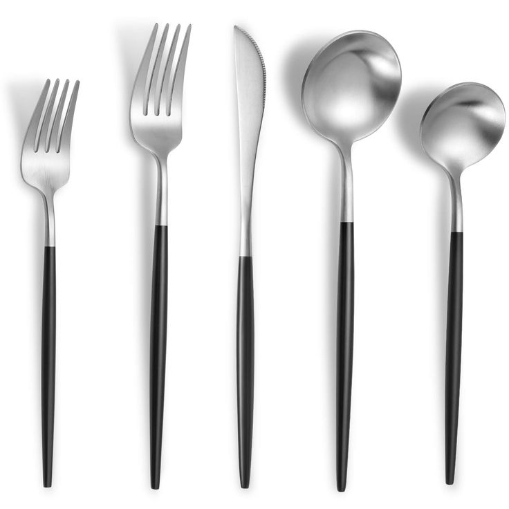 an assortment of utensils and spoons on a white background