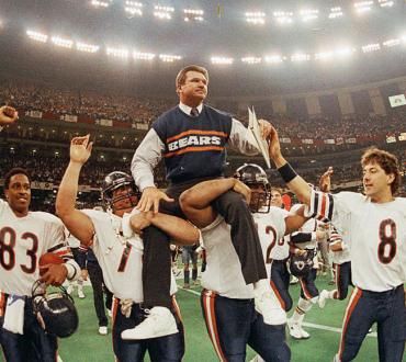 a football player is carried off the field by his teammates