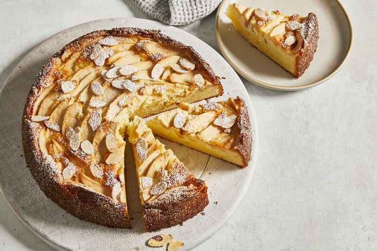 a cake on a plate with two slices cut out