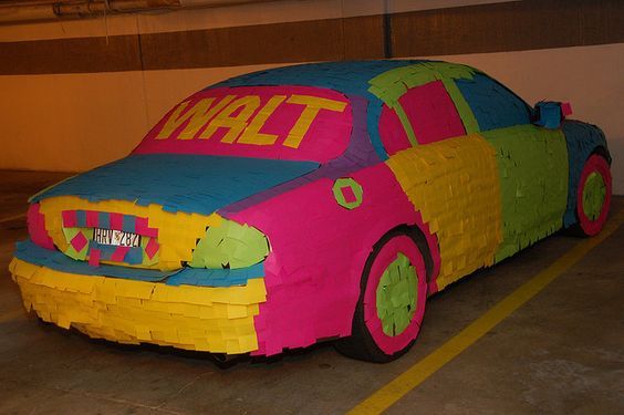 a car made out of paper with the words sticky note prank on it's side