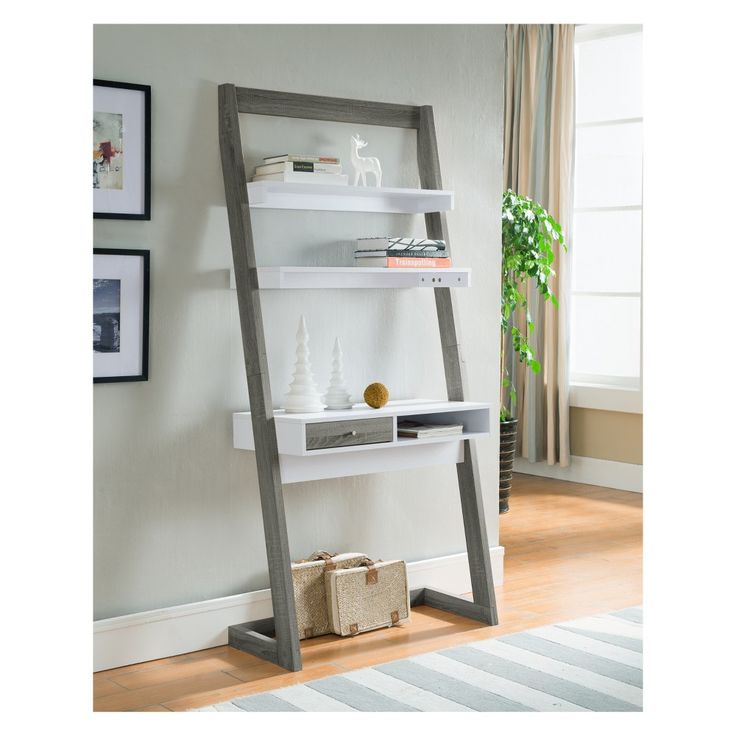 a ladder shelf with books and other items on it