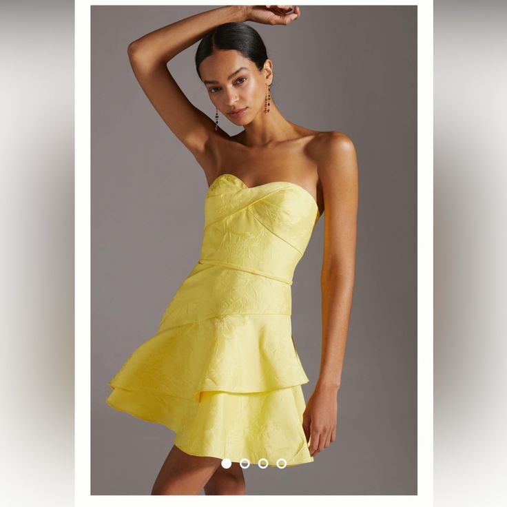 Ml Monique Lhuillier- Anthropologie Strapless Jacquard Mini Dress Yellow Size 16 Very Good Used Condition. Floral Jacquard Adds Stunning Dimension To A Chic Fit-And-Flare Dress Fashioned With A Charming Sweetheart Neck And Asymmetric Tiers At The Stem-Baring Skirt. Cling Rubber Along Top Hidden Back Zipper Sweetheart Neck Strapless Lined 100% Polyester Dry Clean Slight Mark On Left Armpit. Recommend Dry Cleaning. Pit To Pit: 21” Waist: 35” Drop: 26” Bin: 54eg Graduation Guest Outfit, Jacquard Mini Dress, Semi Dresses, Cute Formal Dresses, Cocktail Dress Wedding, Mini Dress Formal, Floral Jacquard, Monique Lhuillier, Hoco Dresses