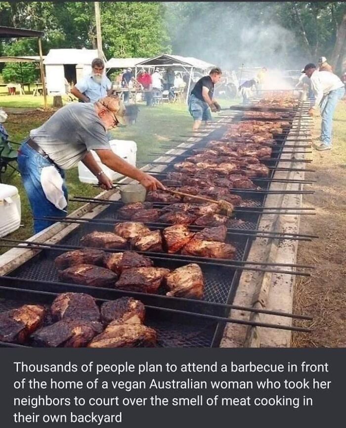 some people are cooking meat on the grill