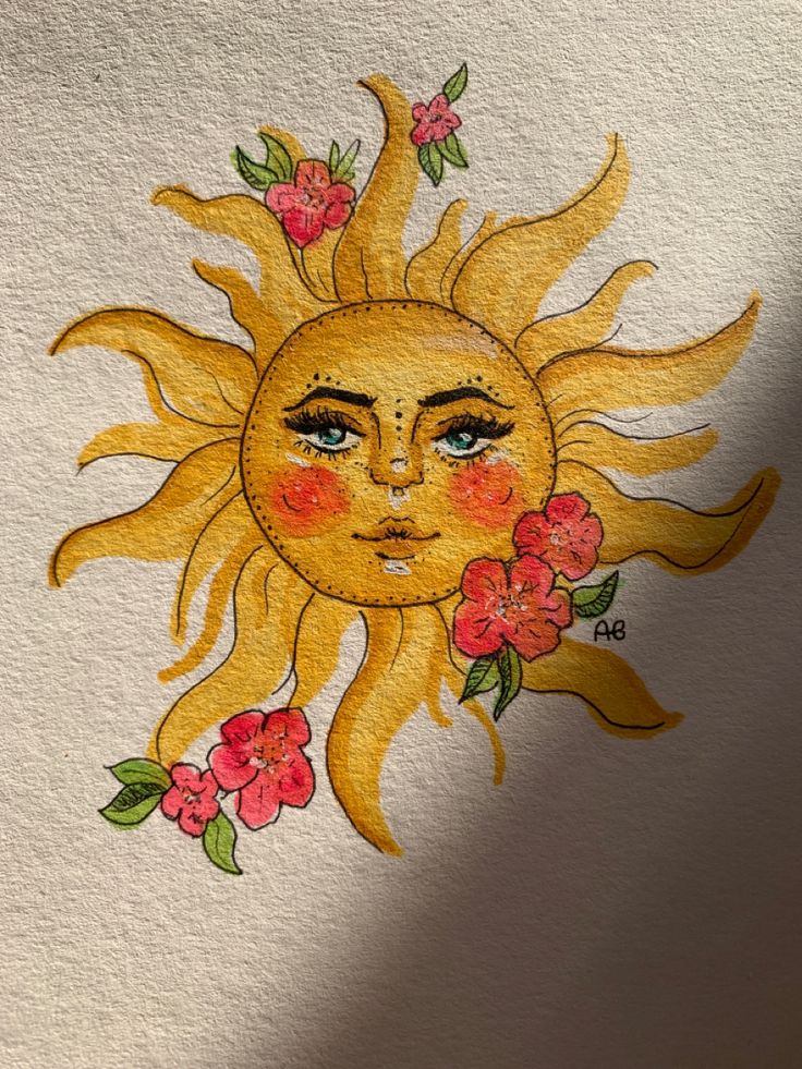 the sun with flowers painted on it's face