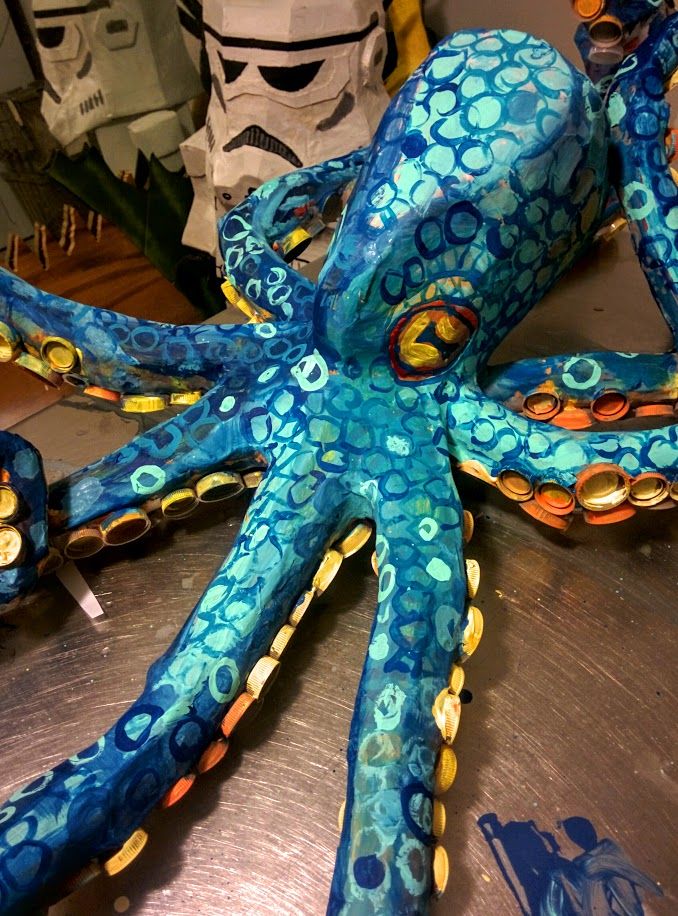 an octopus sculpture sitting on top of a table