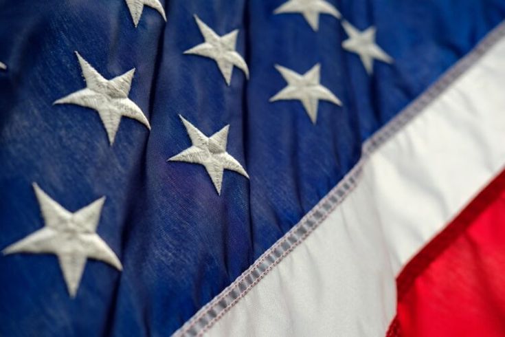 an american flag with silver stars on it's side and the colors red, white, and blue