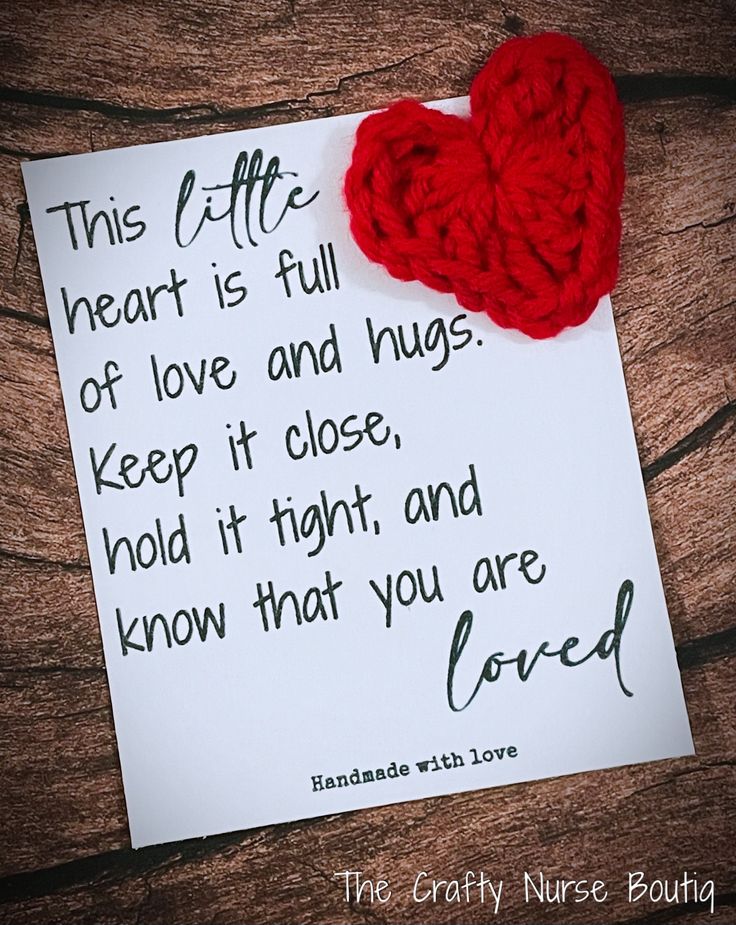 a piece of paper with a red heart on it next to a note that says, this coffee heart is full of love and hugs keep it close, hold it tight, and you are loved