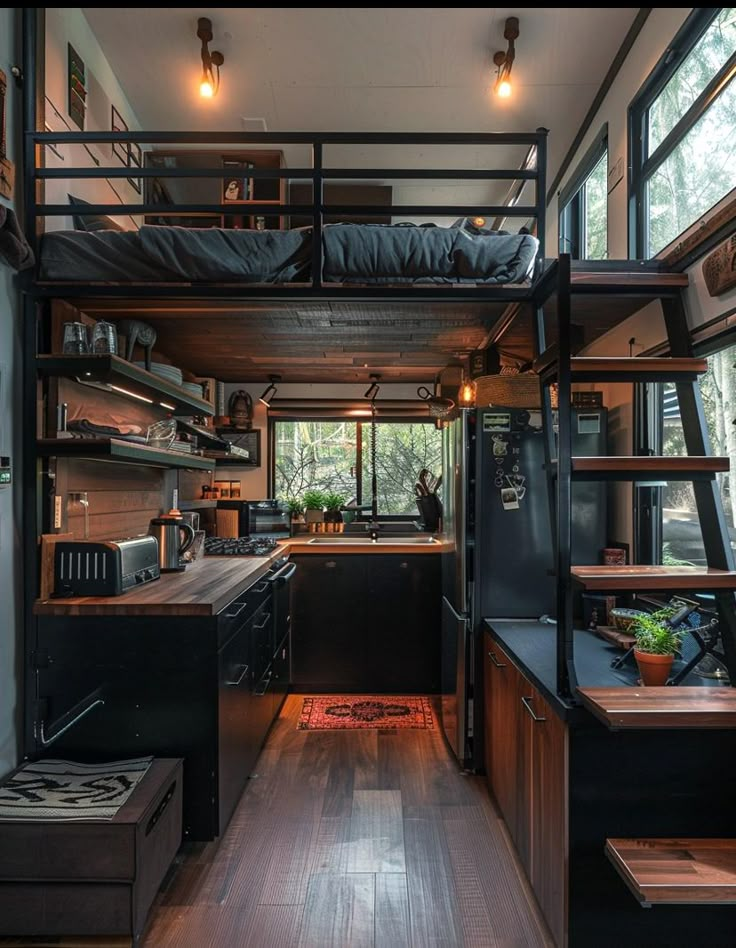 a loft bed is built into the side of a small house with stairs leading up to it