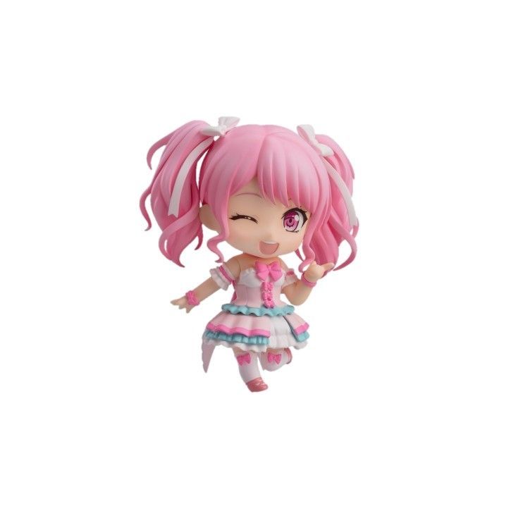 a pink and white doll is flying through the air with her hair in pigtails