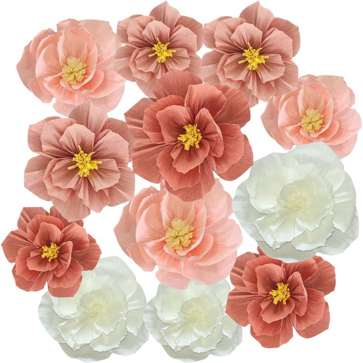 pink and white paper flowers arranged in a circle