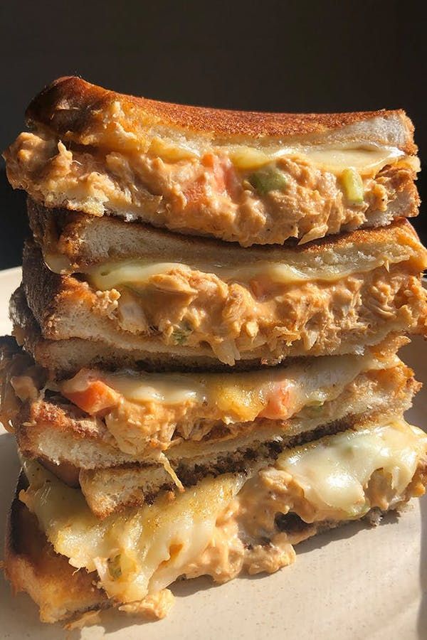 a stack of food sitting on top of a white plate