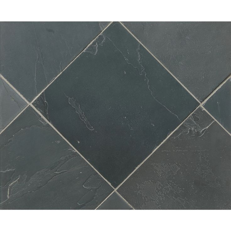 a black and grey tiled floor with some white lines on the bottom half of it