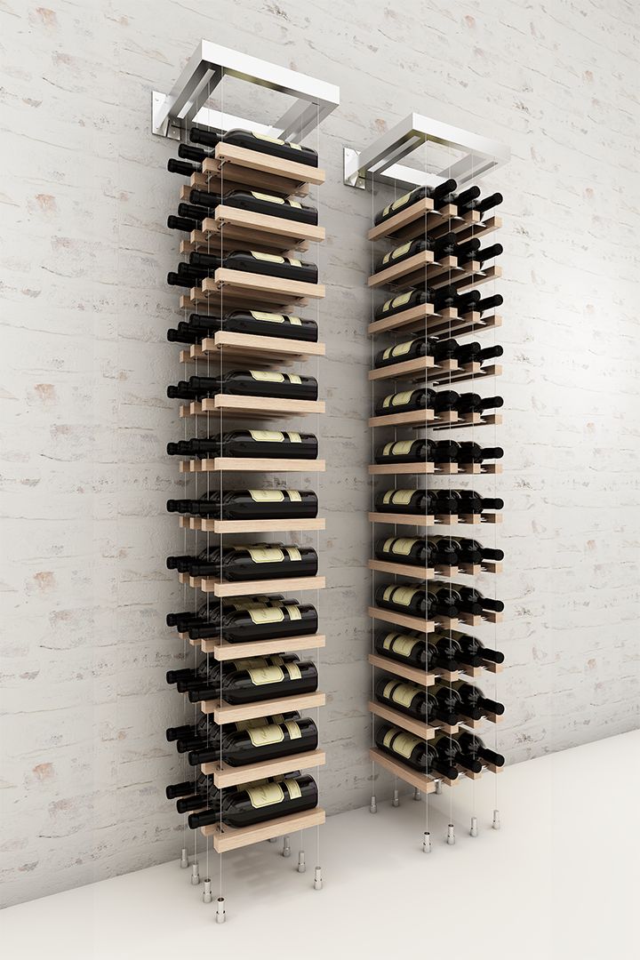 the wine rack is holding several bottles of wine in it's display case,