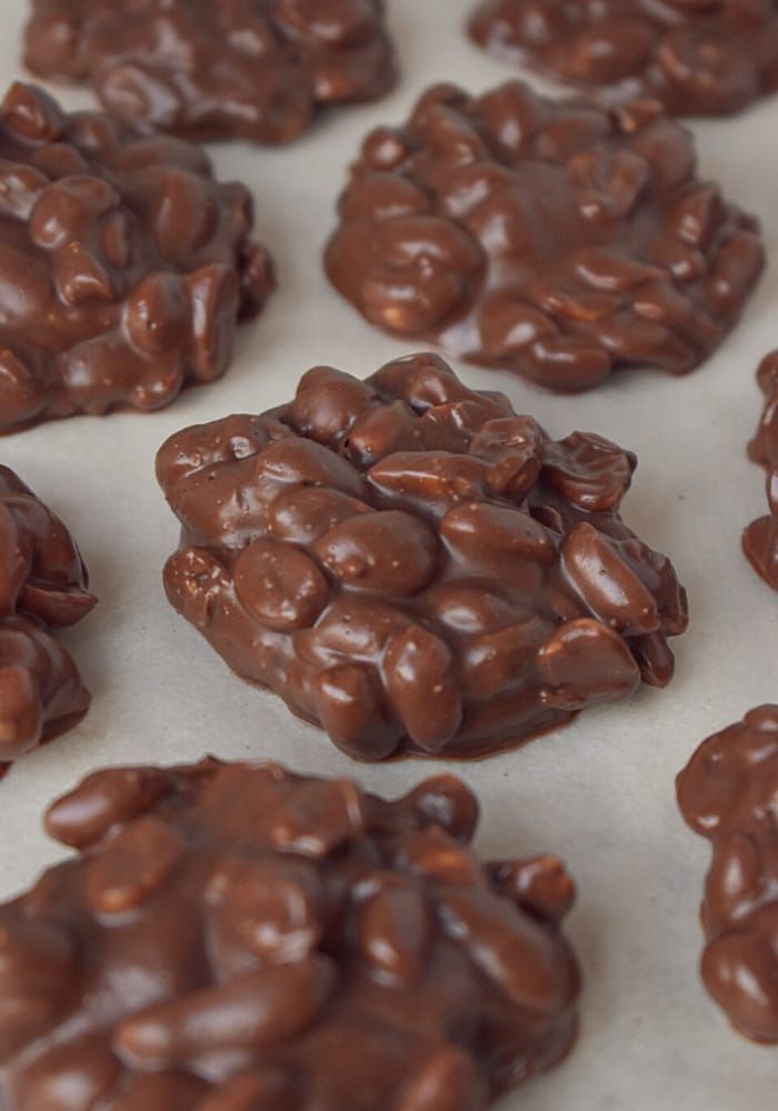 chocolate cookies are arranged on a baking sheet