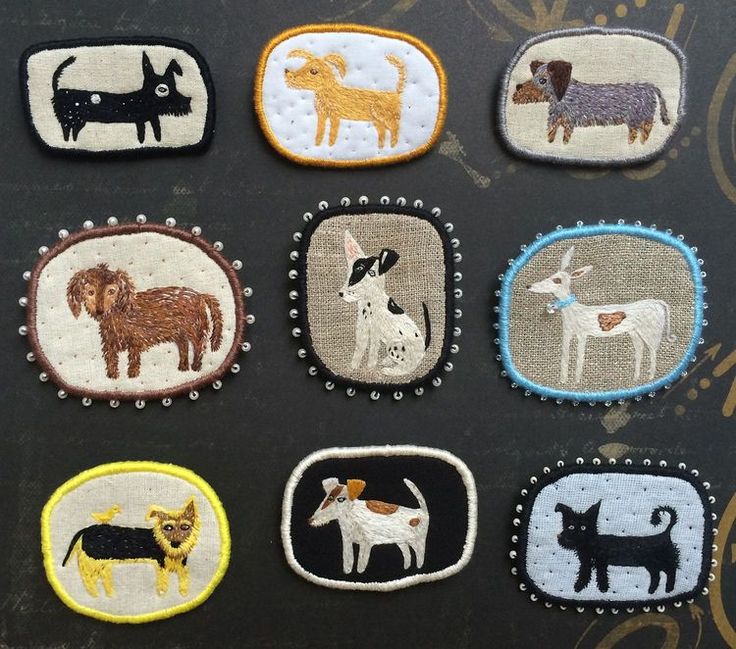 nine embroidered patches with animals on them sitting next to each other, all in different shapes and sizes