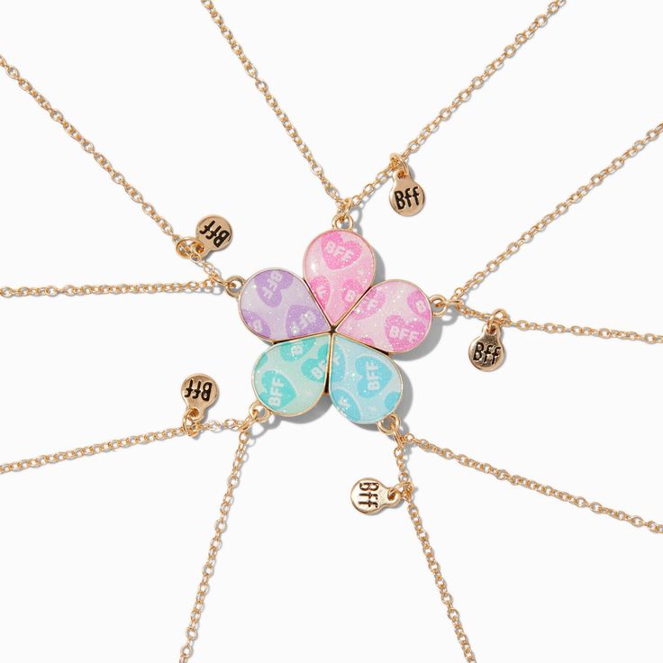 Celebrate friendship by sharing this flower pendant best friends necklace set. Each gold-tone chain necklace includes a petal of the flower plus a little "BFF" charm. Keep one necklace for yourself and share the other four with your besties so that you will always stay connected.Pack Size: 5Finish: Gold-toneLength: 16 + 3 in. extender / 40.64 + 7.62 cm. extender Closure: Lobster claspMaterial: Metal - Claire's Best Friends Glitter Flower Pendant Necklaces - 5 Pack Cute Nickel-free Charm Necklace For Friendship, Friendship Charm Necklaces For Mother's Day, Adjustable Charm Necklaces For Mother's Day And Friendship, Mother's Day Friendship Charm Necklace, Trendy Personalized Charm Necklaces For Best Friend Gift, Trendy Personalized Charm Necklace For Best Friend, Personalized Trendy Charm Necklace For Best Friend, Personalized Flower Jewelry For Friendship, Personalized Flower Shaped Friendship Jewelry