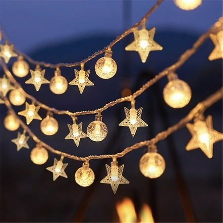 a string of christmas lights with stars on them