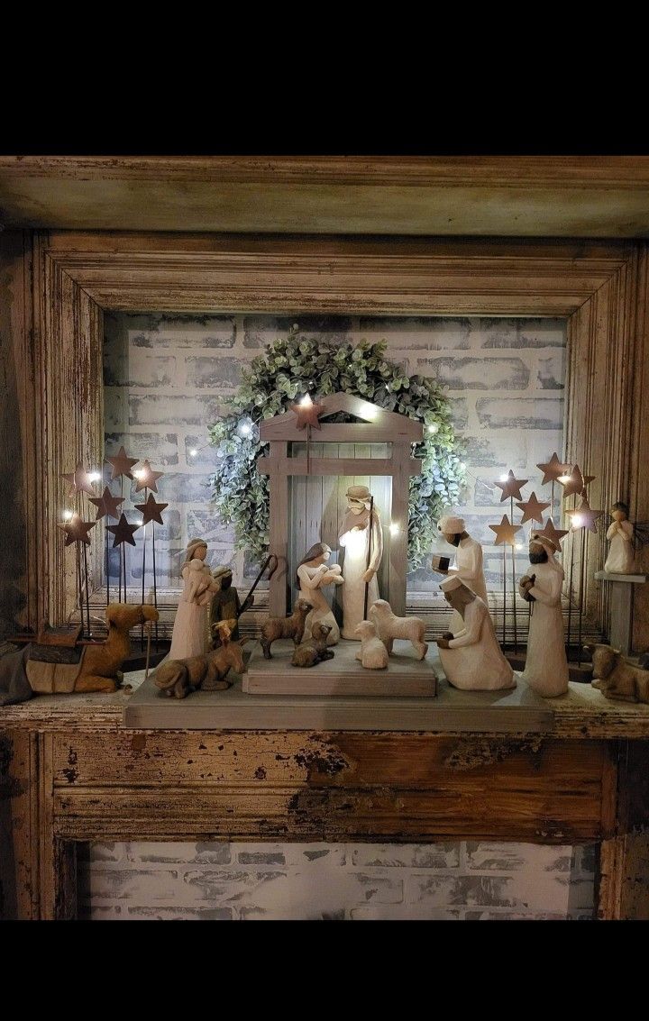 a group of figurines sitting on top of a wooden table next to a mirror