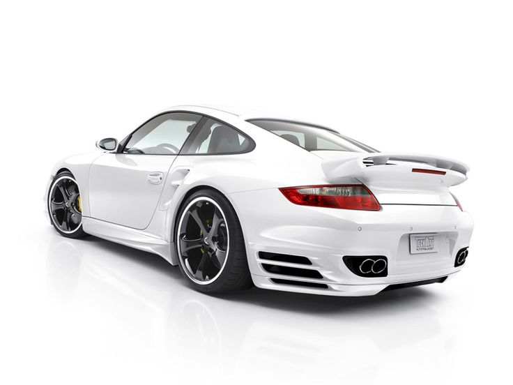 the rear end of a white sports car on a white background with no people around it