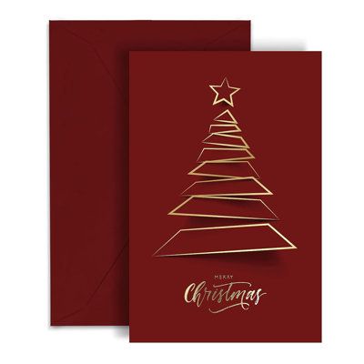 a red christmas card with gold foil on the top and an image of a tree