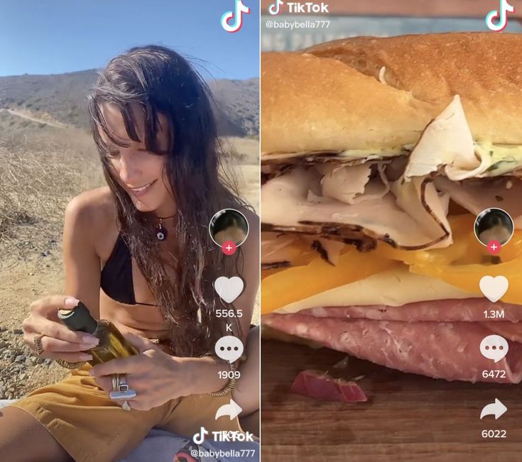 a woman sitting on top of a wooden table next to a giant sandwich with meat and cheese