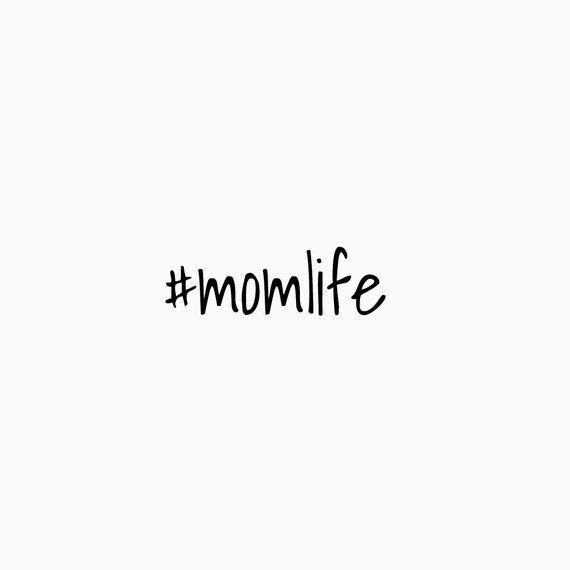 the word momlife written in black ink on a white background